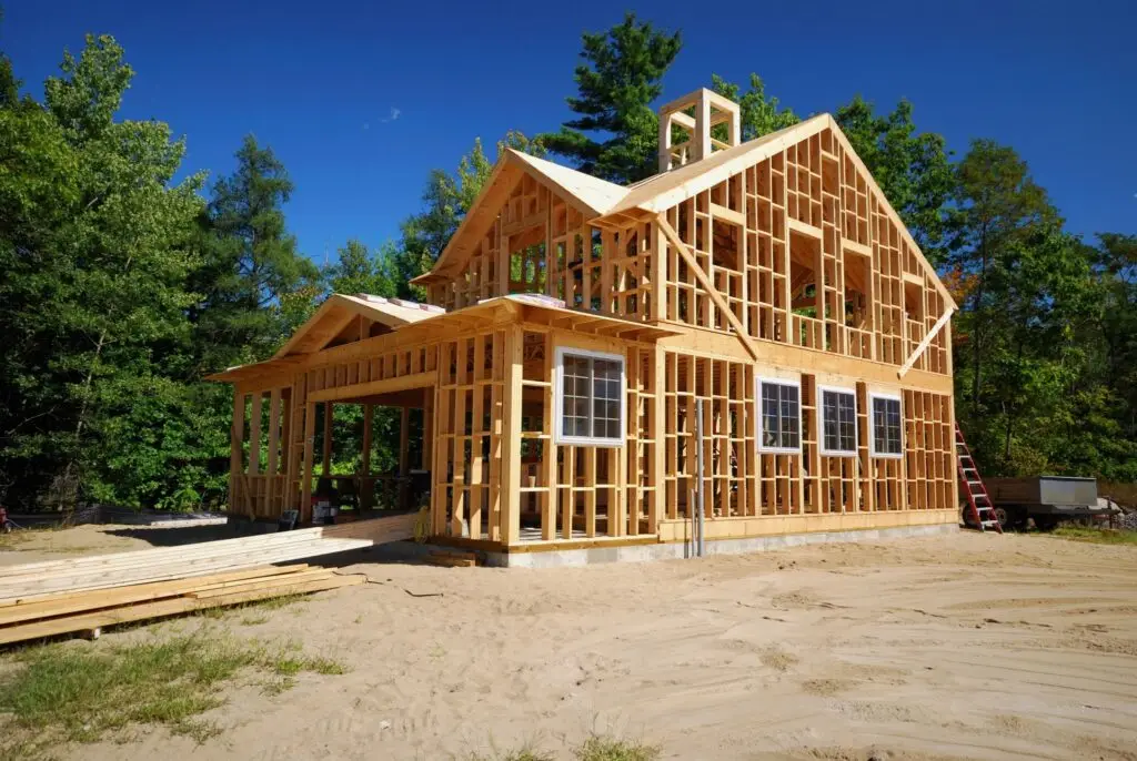 New home under construction with its wood frame in place